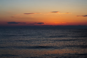 Morning sunrise on the horizon of Aegean sea.