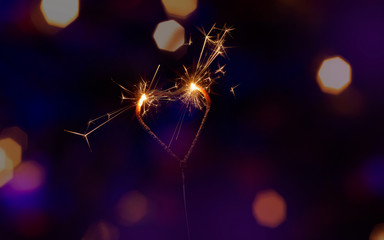 heart sparklers for celebration Valentine's Day and happy new year party background,