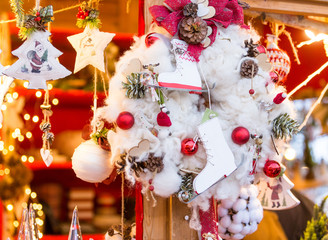 Fototapeta na wymiar Colorful decorations at Christmas market in Strasbourg, Alsace, France.