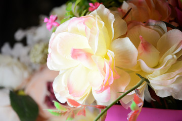 Beautiful artificial flowers like roses and peonies, great background for wedding, Valentine's day, holiday, birthday, beautiful delicate composition