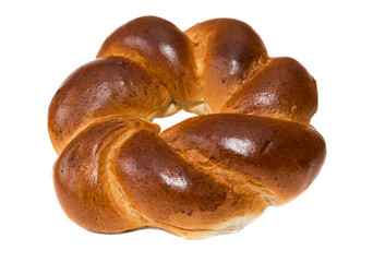 Round challah bread with a hole inside the isolate on a white background. white bread loaf isolated. Loaf of bread isolated on white background