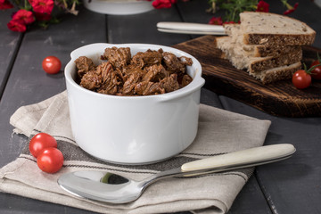 Beef meat stew in ceramic pot.