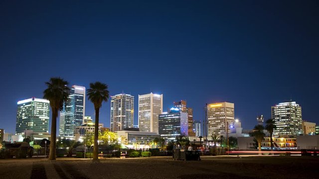 Phoenix AZ Night to Day Generic Cityscape Wide Shot Timelapse with Sun Rising Behind Building Exterior Architectures of the Arizona Downtown Area
