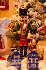 Traditional Christmas holiday nutcrackers figurine ornament. Wooden nutcracker in Christmas market, soldier