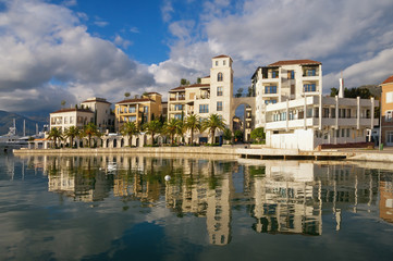 Fototapeta na wymiar Montenegro. Beautiful view of embankment of Tivat city on sunny autumn day
