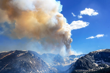 Smoke of a forest fire in the Rocky Mountains of Colorado