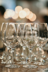 bar interior empty wine glasses and bokeh