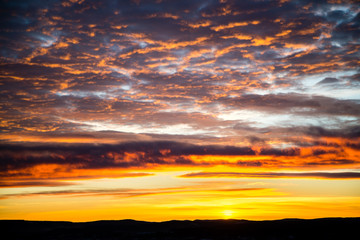 tragic sky, yellow-pink clouds, sunrise, bright colors
