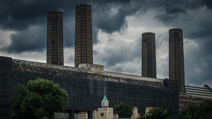 Fototapeta na wymiar Industrial landscape Against A Stormy Sky