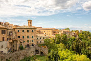 Fototapeta na wymiar View on the hills and houses near Volterra, Tuscany, Italy.