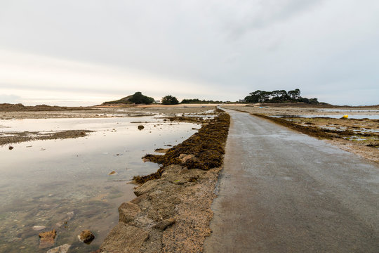 Carantec, France. The submersible passage to Ile Callot, a tidal island only accesible al low tide in the coast of Brittany (Bretagne)