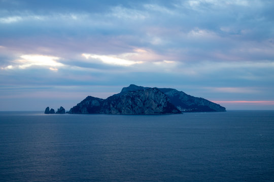 Capri in the evening seen from Punta Campanela,  Sorrento Peninsula, Italy