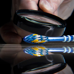 Quality control toothbrush