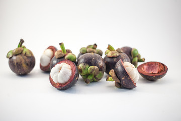 Isolated mangosteens. Plenty fruits isolated on white background top view
