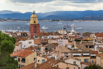 Fototapeta na wymiar View to the rooftops and church tower of the old town of Saint Tropez, French Rivera, France.