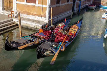 Obraz premium Venice, gondola on the background of the city