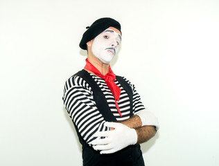 mime man crossed hands and look at camera. Emotions and feelings concept. isolated on white...