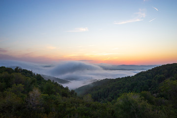 Obraz na płótnie Canvas Nice sunrise with low clouds from the Olèrdola mountains, Barcelona, Spain