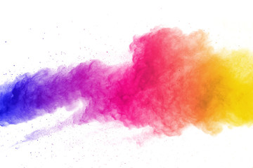 abstract powder splatted background. Colorful powder explosion on white background. Colored cloud....