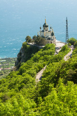Beautiful Church Of The Resurrection on the hill in front of the sea.