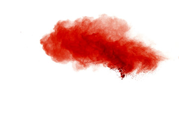 Freeze motion of red powder exploding, isolated on white background. Abstract design of red dust cloud. Particles explosion screen saver, wallpaper