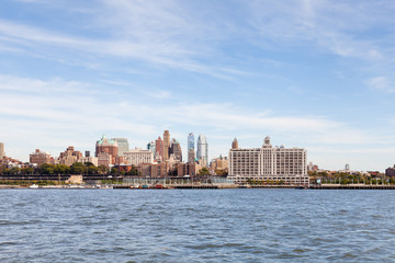 Fototapeta premium Brooklyn Skyline. A view of the Brooklyn skyline in New York City as viewed from Manhattan across the East River.