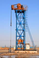 Fototapeta na wymiar tower type pumping unit under blue sky