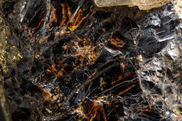 Macro of a mineral stone Sphalerite with fluorite and pyrite on a black background close up