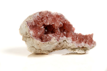Macro mineral stone Pink Amethyst on a white background