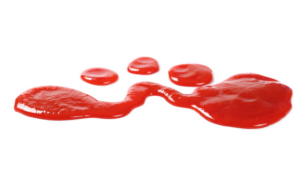 red ketchup splashes isolated on white background, tomato pure texture