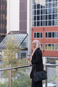 Woman standing in balcony