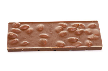 A bar of chocolate with almonds on a white background isolation