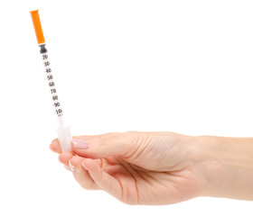 Insulin syringe in hand medical medicine on a white background. Isolation