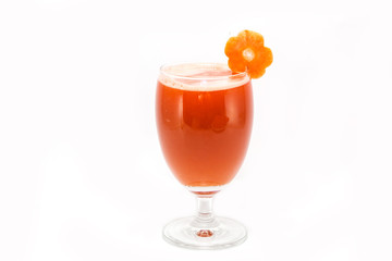 Carrot juice and slices of carrot isolated on white
