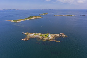 Fototapeta na wymiar Boston Lighthouse on Little Brewster Island in Boston Harbor, Boston, Massachusetts, USA.
