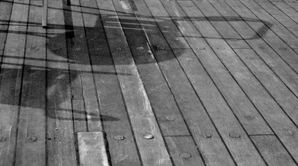 Chair shadow on a wooden floor