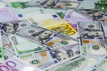 Fototapeta na wymiar euro banknotes and dollars randomly laid out 3