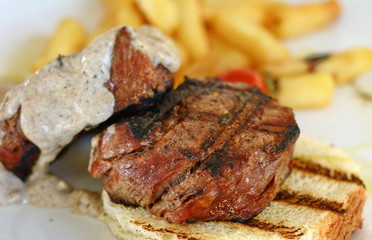 Juicy steak and grilled vegetables with spices