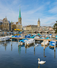 The Limmat river and buildings of the historic part of the city of Zurich in winter. Zurich is the largest city in Switzerland and the capital of the Swiss canton of Zurich.