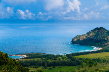 Aerial view overlooking the tropical island of Kauai and the Pacific Ocean, Hawaii.