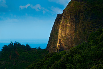 Fototapeta na wymiar Foreboding stone cliff wall on the island of Kauai, Hawaii, USA