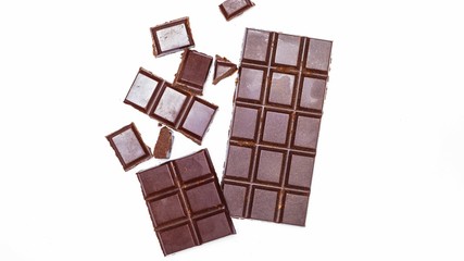 Milk bar chocolate on white isolated background. Top view. 