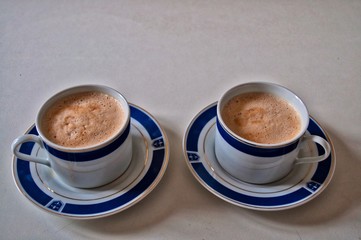 cup of cappuccino on wooden table traditional italian breakfast 