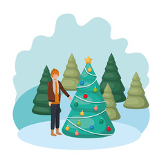 man with christmas tree in landscape