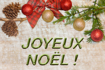 Christmas postcard for greetings. Metallic letters on natural wood background. Red, golden and white Xmas wallpaper. 