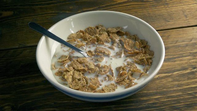 Milk Poured On Breakfast Cereal