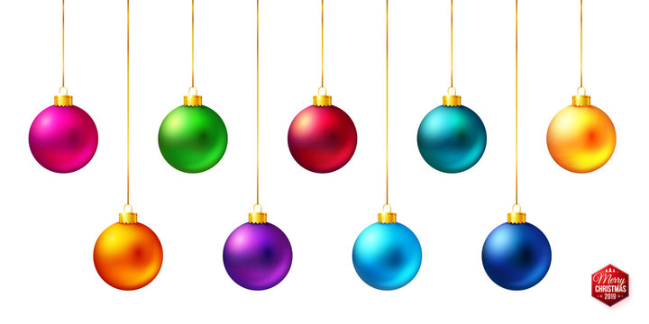 Set of nine shiny, bright and realistic colored Christmas balls hanging on white.