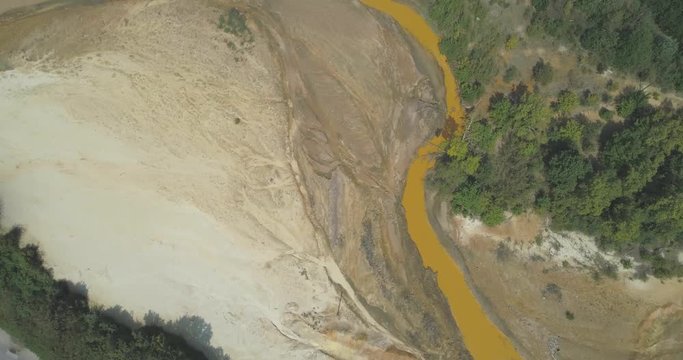 Aerial view of a mining waste disposal and the ecological damage
