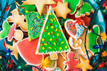 Plate with tasty holiday Gingerbread Cookies - Happy New Year card 