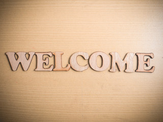 Welcome in Wooden Word Concept